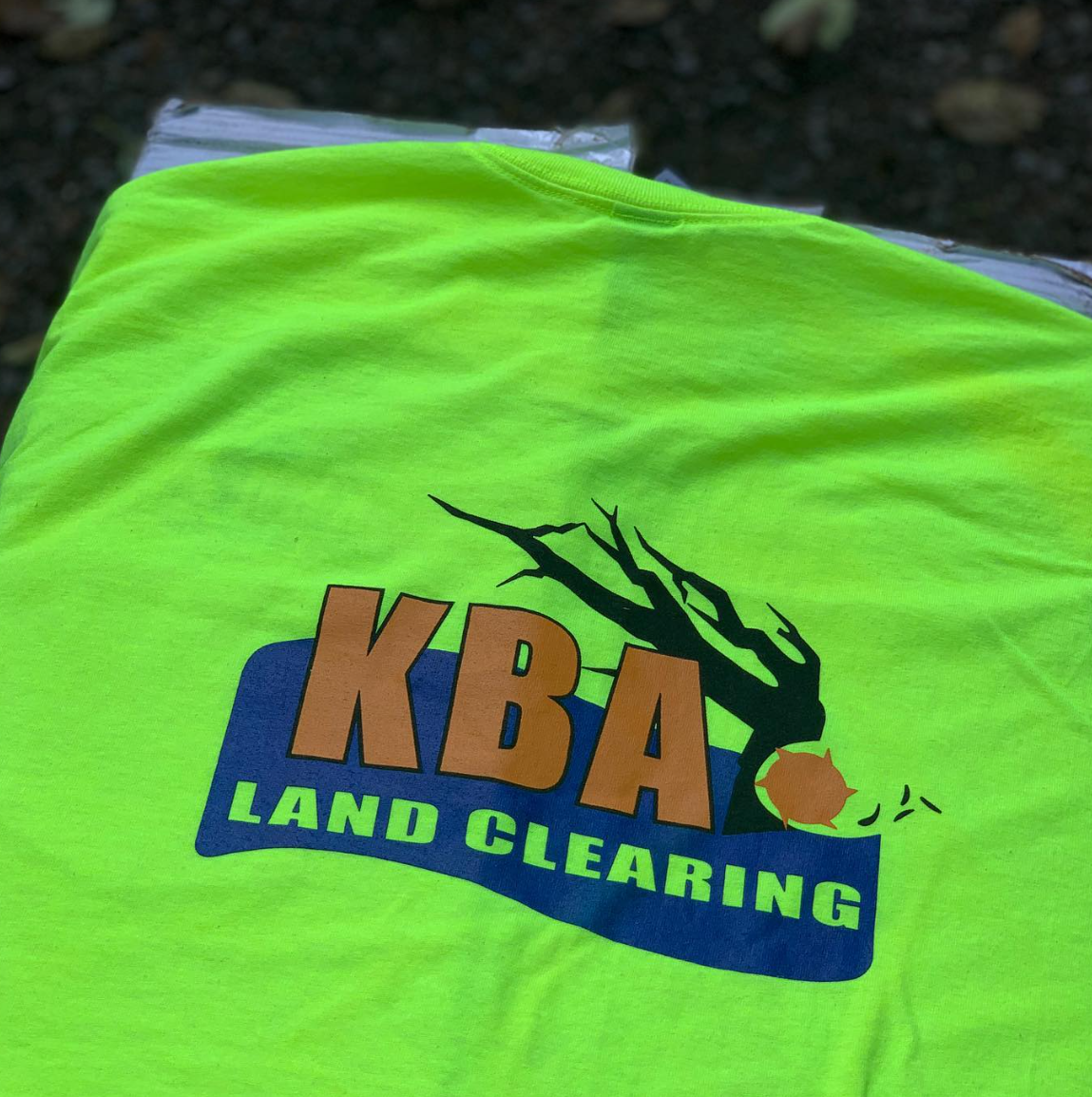 Hi-vis safety green t-shirt screen printed with KBA Land Clearing logo