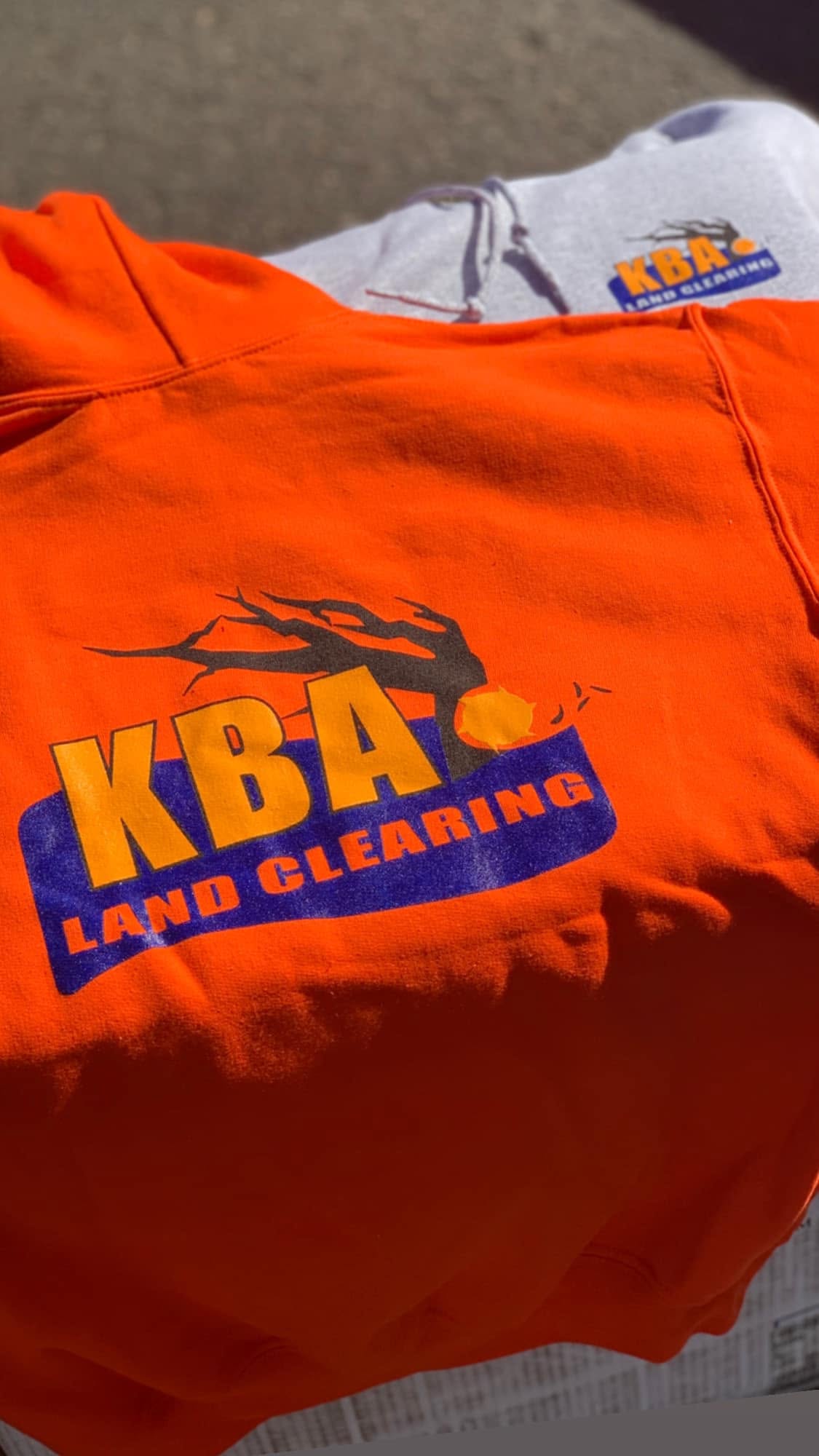 KBA Land Clearing safety orange hooded sweatshirts